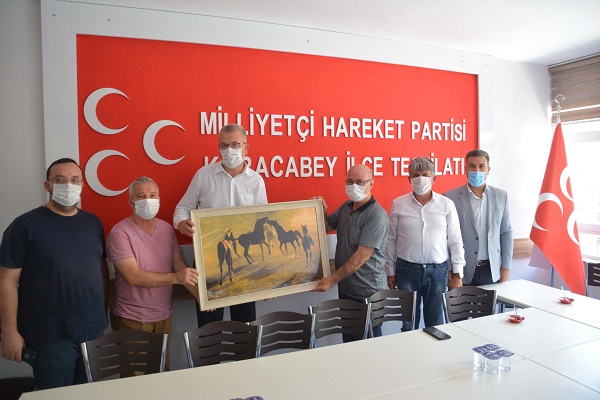Başkan Özkan’dan MHP’ye “hayırlı olsun” ziyareti